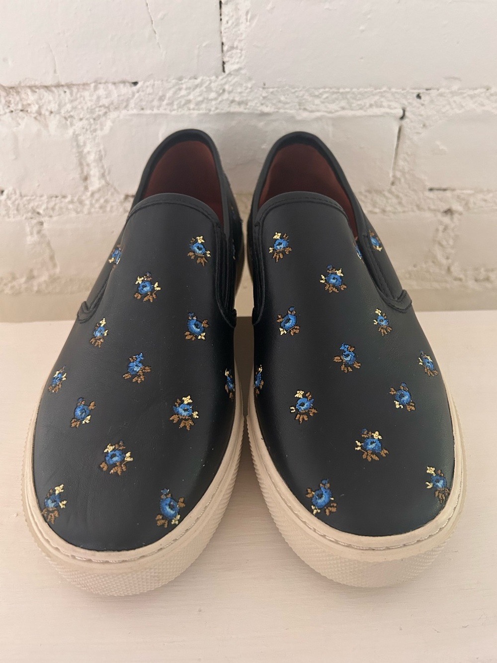Authentic Coach “Prairie” Embroidered Floral Slip On Sneakers
Size: 7.5 
EUC